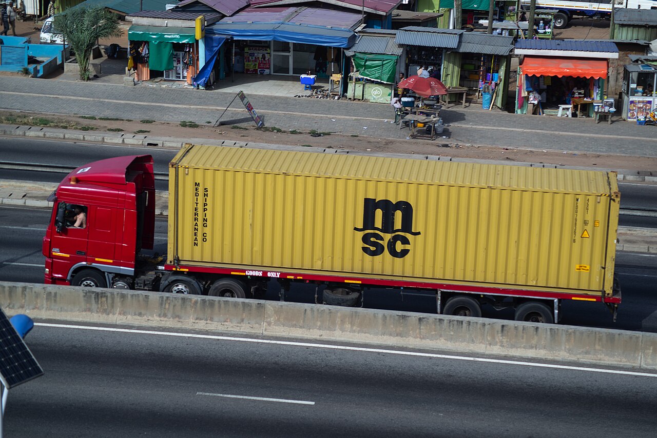 Articulated trucks parked dangerously along the shoulders of the Accra-Kumasi highway