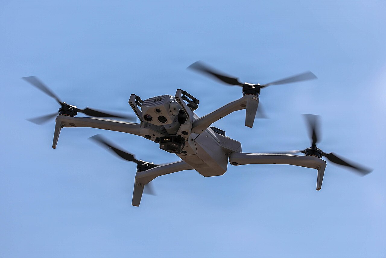 Security consultant discussing airspace regulations and drone bans in Accra, Ghana