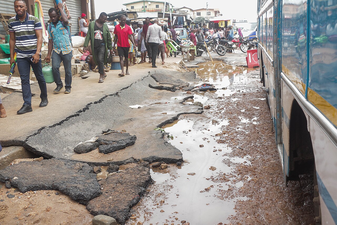 Flooded residential area in Hohoe showing receding water levels and affected properties