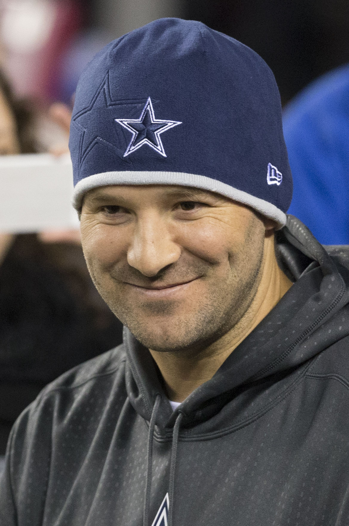 Former CBS NFL analyst and Dallas Cowboys quarterback Tony Romo speaking at a sports event